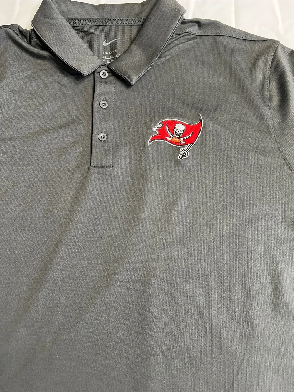 Nike Football Tampa Bay Buccaneers.   Polo with Red Tampa Bay logo embroidery